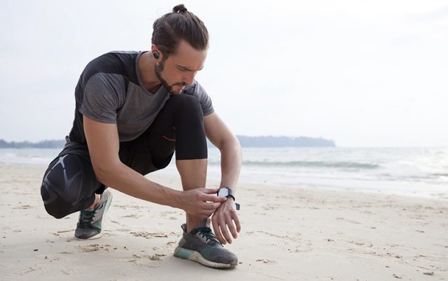 Man Checking His Watch Before The Run