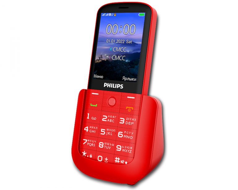 Телефон филипс е227. Philips Xenium e125. Филипс ксениум кнопочный. Кнопочный телефон с подставкой для зарядки. Кнопочный телефон Philips с джойстиком.