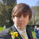 Том Причард