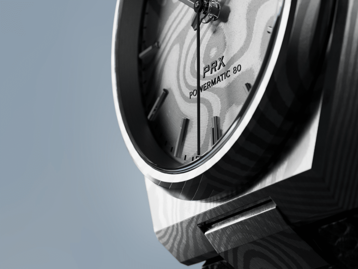 Часы Tissot PRX из дамасской стали: материал, который впечатляет картинка Часы Tissot PRX Damascus Steel 38 мм: уникальный подарок