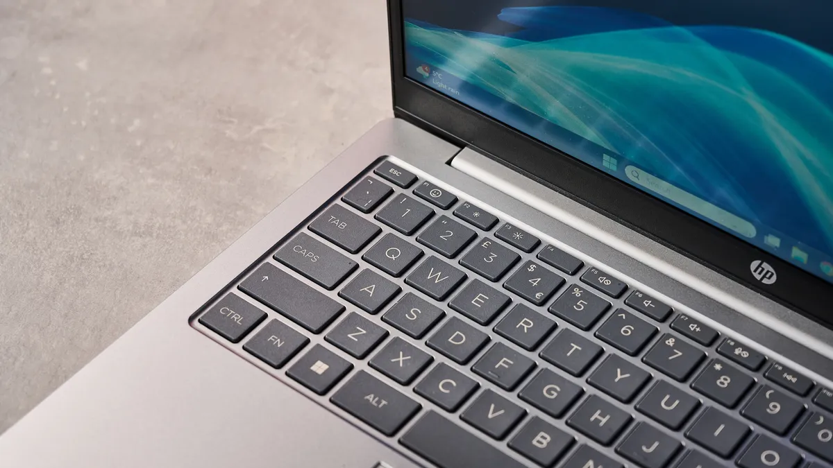 Обзор ноутбука HP Laptop 14: элегантный, но бесполезный картинка HP Laptop 14