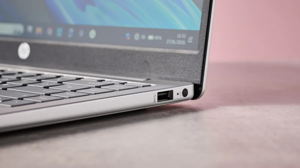 Обзор ноутбука HP Laptop 14: элегантный, но бесполезный картинка HP Laptop 14